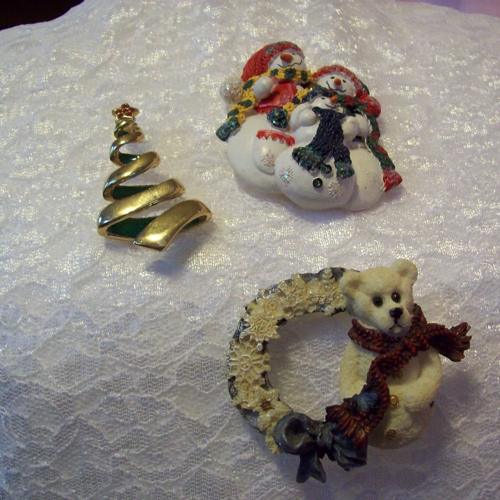 Three Christmas Brooches